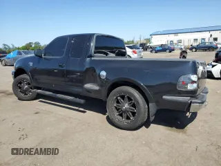 1999 Ford F-150 XL с VIN 2FTRX08L4XCA00426, выставлен на аукционе Copart как лот 68354464 с пробегом 157 539 миль миль и Списание • Salvage title. История ставок и продаж доступна на DreamBid. Изображение 2.