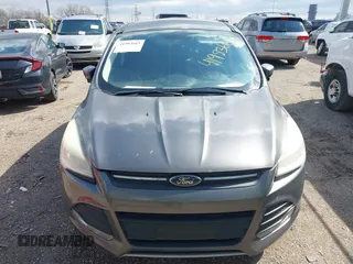 2013 Ford Escape SE with VIN 1FMCU9GX5DUD72758, listed as a IAAI auction lot 41983665 with 282,604 mi miles. Bid and sale history available at carsss.com. Image 6.