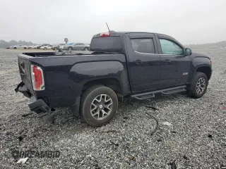 2015 GMC Canyon 4WD SLE with VIN 1GTG6BE37F1157166, listed as a Copart auction lot 71279914 with 114,484 mi miles and Salvage Title. Bid and sale history available at carsss.com. Image 3.