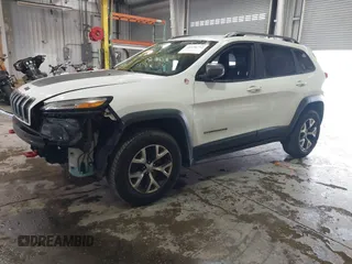 2016 Jeep Cherokee Trailhawk z VIN 1C4PJMBS6GW242123, wystawiony jako IAAI lot #41156712 z przebiegiem 136 596 mil mil oraz . Historia ofert i sprzedaży dostępna na DreamBid. Obrazek 19.