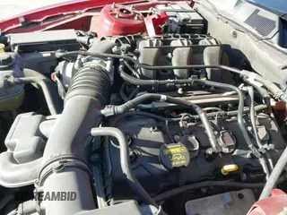 2011 Ford Mustang V6 z VIN 1ZVBP8AMXB5165352, wystawiony jako IAAI lot #42333408 z przebiegiem 138 063 mil mil oraz . Historia ofert i sprzedaży dostępna na DreamBid. Obrazek 12.