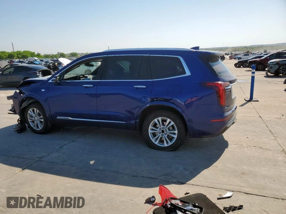 2023 Cadillac XT6 FWD Luxury z VIN 1GYKPAR42PZ167668, wystawiony jako Copart lot #53278075 z przebiegiem 32 212 mil mil oraz Szkoda całkowita • Salvage title. Historia ofert i sprzedaży dostępna na DreamBid. Obrazek 2.