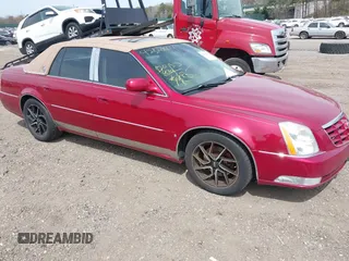 2006 Cadillac DTS w/1SE with VIN 1G6KD57996U113240, listed as a IAAI auction lot 42120004 with 120,806 mi miles. Bid and sale history available at carsss.com. Image 1.