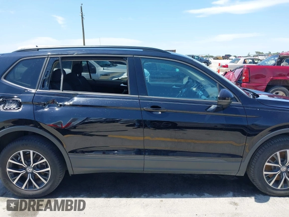 2021 Volkswagen Tiguan S with VIN 3VV1B7AX9MM067347, listed as a IAAI auction lot 42305101 with 77,042 mi miles and . Bid and sale history available at DreamBid. Image 13.