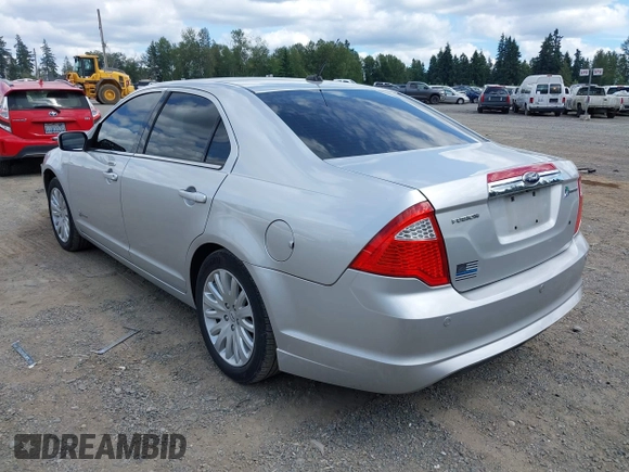 2012 Ford Fusion Hybrid with VIN 3FADP0L35CR440051, listed as a IAAI auction lot 42644284 with 89,087 mi miles and . Bid and sale history available at DreamBid. Image 3.