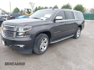 2015 Chevrolet Suburban LTZ with VIN 1GNSKKKC4FR712965, listed as a IAAI auction lot 41928053 with 188,571 mi miles. Bid and sale history available at carsss.com. Image 2.