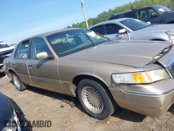2000 Mercury Grand Marquis LS z VIN 2MEFM75W5YX627647, wystawiony jako IAAI lot #42072795 z przebiegiem 188 113 mil mil oraz . Historia ofert i sprzedaży dostępna na DreamBid. Obrazek 13.