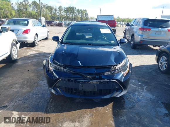 2019 Toyota Corolla Hatchback SE with VIN JTNK4RBE1K3024766, listed as a IAAI auction lot 42037121 with 121,595 mi miles. Bid and sale history available at carsss.com. Image 12.
