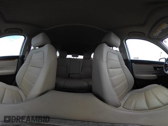 2018 Honda CR-V Touring with VIN 2HKRW2H91JH665241, listed as a IAAI auction lot 42638694 with 62,066 mi miles and . Bid and sale history available at DreamBid. Image 18.