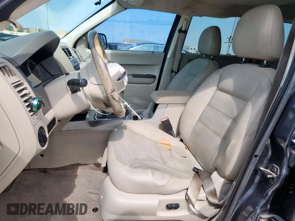 2008 Ford Escape XLT with VIN 1FMCU03128KA81939, listed as a Copart auction lot 63922515 with 182,089 mi miles and Salvage title. Bid and sale history available at DreamBid. Image 7.