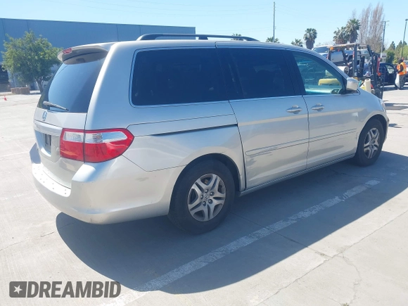 2006 Honda Odyssey EX-L with VIN 5FNRL38766B038599, listed as a IAAI auction lot 41989217 with 164,118 mi miles. Bid and sale history available at carsss.com. Image 4.
