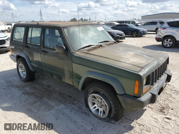 1997 Jeep Cherokee SE with VIN 1J4FT28SXVL540135, listed as a Copart auction lot 77043714 with 0 mi miles and Clean Title. Bid and sale history available at carsss.com. Image 4.