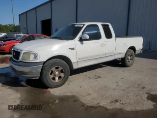 2002 Ford F-150 XL z VIN 1FTRX17242NA00590, wystawiony jako Copart lot #54168985 z przebiegiem 197 866 mil mil oraz Szkoda całkowita • Salvage title. Historia ofert i sprzedaży dostępna na DreamBid. Obrazek 1.