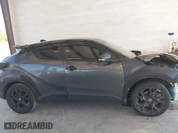 2021 Toyota C-HR LE with VIN JTNKHMBX5M1129253, listed as a IAAI auction lot 42169707 with 54,312 mi miles and . Bid and sale history available at DreamBid. Image 14.
