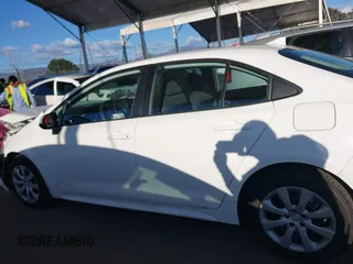 2022 Toyota Corolla LE with VIN 5YFEPMAE3NP276964, listed as a IAAI auction lot 41714701 with 63,597 mi miles. Bid and sale history available at carsss.com. Image 14.