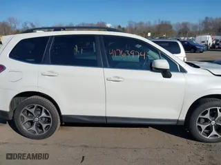 2016 Subaru Forester 2.0XT Premium with VIN JF2SJGDC3GH527384, listed as a IAAI auction lot 41763974 with 107,411 mi miles. Bid and sale history available at carsss.com. Image 13.