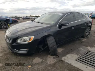 2017 Volvo S60 Inscription with VIN LYV402HK7HB137700, listed as a Copart auction lot 80926284 with 77,606 mi miles and Salvage Title. Bid and sale history available at carsss.com. Image 1.