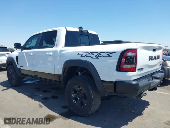 2022 Ram 1500 TRX with VIN 1C6SRFU95NN245954, listed as a IAAI auction lot 42032210 with 30,870 mi miles and . Bid and sale history available at DreamBid. Image 3.