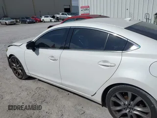 2015 Mazda 6 i Grand Touring with VIN JM1GJ1W50F1204322, listed as a IAAI auction lot 40694216 with 141,357 mi miles. Bid and sale history available at carsss.com. Image 14.