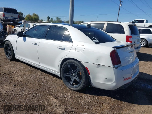2012 Chrysler 300 SRT-8 with VIN 2C3CCAFJ9CH801749, listed as a IAAI auction lot 40912606 with 144,404 mi miles and . Bid and sale history available at DreamBid. Image 3.