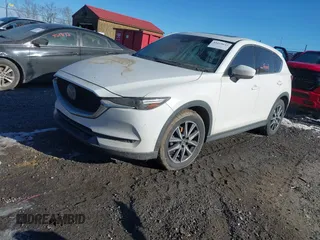 2017 Mazda CX-5 Grand Touring with VIN JM3KFBDL2H0171021, listed as a IAAI auction lot 41619642 with 67,581 mi miles. Bid and sale history available at carsss.com. Image 2.