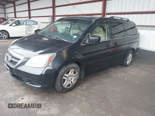 2007 Honda Odyssey EX-L z VIN 5FNRL38787B050884, wystawiony jako IAAI lot #41930632 z przebiegiem 204 452 mil mil oraz . Historia ofert i sprzedaży dostępna na DreamBid. Obrazek 2.