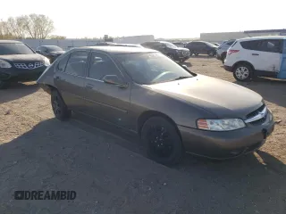 2001 Nissan Altima GXE with VIN 1N4DL01D51C190961, listed as a Copart auction lot 76087304 with 180,295 mi miles and Salvage Title. Bid and sale history available at carsss.com. Image 4.