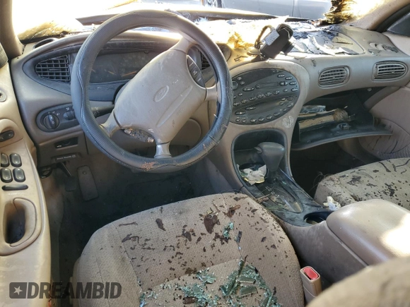 1998 Ford Taurus SE Comfort z VIN 1FAFP53S1WG176478, wystawiony jako Copart lot #80528034 z przebiegiem Nie podano mil oraz Szkoda całkowita • Salvage title. Historia ofert i sprzedaży dostępna na DreamBid. Obrazek 8.