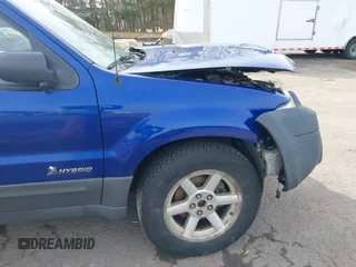 2005 Ford Escape Hybrid with VIN 1FMCU96HX5KC07148, listed as a IAAI auction lot 41741158 with 225,598 mi miles. Bid and sale history available at carsss.com. Image 15.