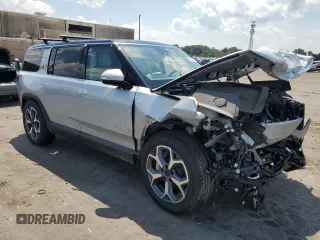 2024 Rivian R1S Adventure with VIN 7PDSGBBA1RN041672, listed as a Copart auction lot 61924974 with Not Provided miles and Salvage Title. Bid and sale history available at carsss.com. Image 4.
