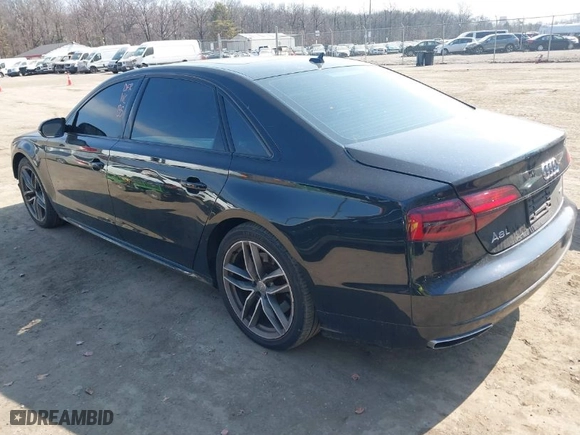 2017 Audi A8 L with VIN WAU44AFDXHN004395, listed as a IAAI auction lot 41705688 with 63,282 mi miles. Bid and sale history available at carsss.com. Image 3.