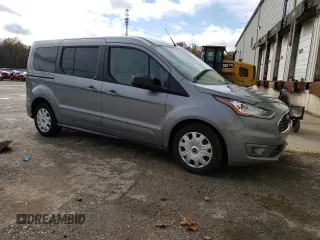 2022 Ford Transit Connect XLT z VIN NM0GS9F23N1535280, wystawiony jako Copart lot #81914514 z przebiegiem 100 191 mil mil oraz Czysty tytuł • Clean title. Historia ofert i sprzedaży dostępna na DreamBid. Obrazek 4.