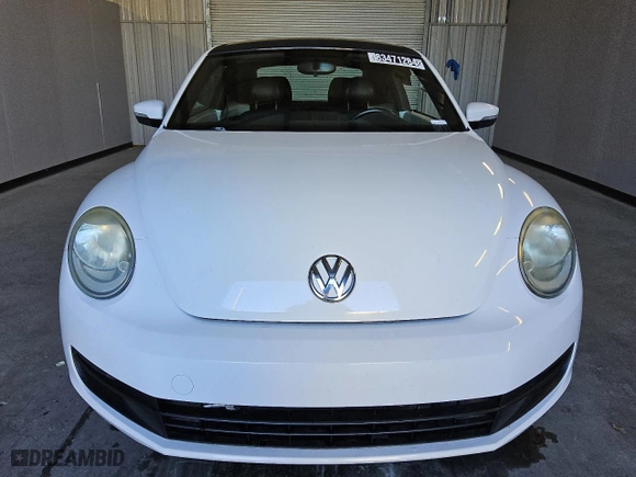 2012 Volkswagen Beetle 2.5L w/Sun/Sound/Nav PZEV with VIN 3VWHP7AT5CM638470, listed as a Copart auction lot 83471284 with 87,912 mi miles and Clean Title. Bid and sale history available at carsss.com. Image 5.