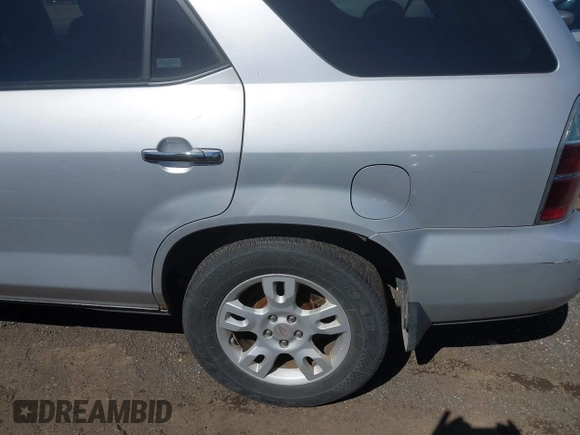 2004 Acura MDX Touring Pkg RES w/Nav with VIN 2HNYD189X4H523022, listed as a IAAI auction lot 41804292 with 165,586 mi miles. Bid and sale history available at carsss.com. Image 14.