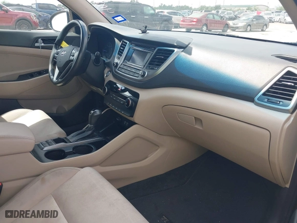 2017 Hyundai Tucson Value with VIN KM8J33A27HU430198, listed as a IAAI auction lot 42104369 with 163,929 mi miles. Bid and sale history available at carsss.com. Image 5.