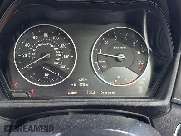 2016 BMW X1 xDrive28i with VIN WBXHT3Z3XG4A48557, listed as a IAAI auction lot 41387960 with 84,821 mi miles. Bid and sale history available at carsss.com. Image 7.