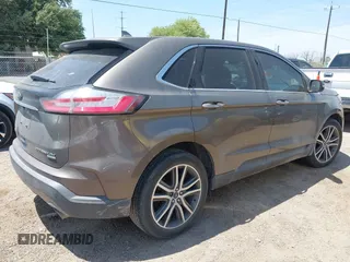 2019 Ford Edge Titanium z VIN 2FMPK3K91KBB48872, wystawiony jako IAAI lot #42020383 z przebiegiem 79 612 mil mil oraz . Historia ofert i sprzedaży dostępna na DreamBid. Obrazek 4.