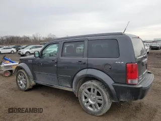 2011 Dodge Nitro Heat with VIN 1D4PU4GX0BW501101, listed as a Copart auction lot 84896064 with 146,945 mi miles and Salvage Title. Bid and sale history available at DreamBid. Image 2.