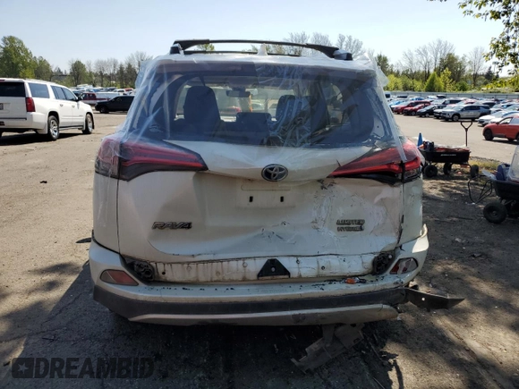 2016 Toyota RAV4 Limited z VIN JTMDJREVXGD058336, wystawiony jako Copart lot #54449295 z przebiegiem 108 837 mil mil oraz Szkoda całkowita • Salvage title. Historia ofert i sprzedaży dostępna na DreamBid. Obrazek 6.