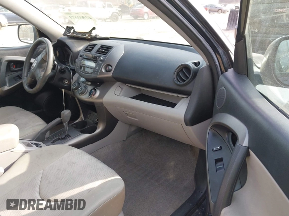 2009 Toyota RAV4 with VIN JTMBF33V995000790, listed as a IAAI auction lot 41901673 with 154,174 mi miles. Bid and sale history available at carsss.com. Image 5.