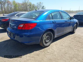2009 Chrysler Sebring LX with VIN 1C3LC46B59N503726, listed as a IAAI auction lot 42072108 with 148,650 mi miles and . Bid and sale history available at DreamBid. Image 4.