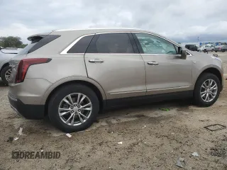 2022 Cadillac XT5 FWD Premium Luxury with VIN 1GYKNCRS1NZ117079, listed as a Copart auction lot 41448805 with 17,552 mi miles and Salvage title. Bid and sale history available at DreamBid. Image 3.