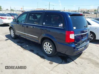 2014 Chrysler Town & Country Touring with VIN 2C4RC1BGXER131707, listed as a IAAI auction lot 42017348 with 120,790 mi miles and . Bid and sale history available at DreamBid. Image 3.