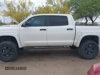 2016 Toyota Tundra SR5 z VIN 5TFDW5F15GX491017, wystawiony jako IAAI lot #42033427 z przebiegiem 97 290 mil mil oraz . Historia ofert i sprzedaży dostępna na DreamBid. Obrazek 14.