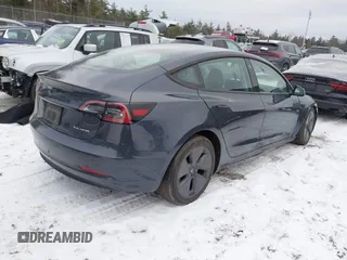 2023 Tesla Model 3 Long Range with VIN 5YJ3E1EBXPF708122, listed as a IAAI auction lot 41185314 with 27,765 mi miles and . Bid and sale history available at DreamBid. Image 4.