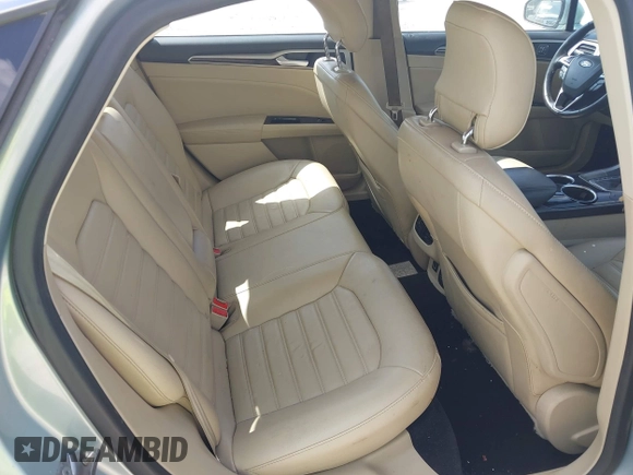 2013 Ford Fusion SE Hybrid z VIN 3FA6P0LU8DR265460, wystawiony jako IAAI lot #42720385 z przebiegiem 146 179 mil mil oraz . Historia ofert i sprzedaży dostępna na DreamBid. Obrazek 8.