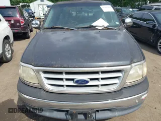 1999 Ford F-150 with VIN 1FTRX17W8XNA20352, listed as a IAAI auction lot 42485616 with 208,142 mi miles and . Bid and sale history available at DreamBid. Image 6.