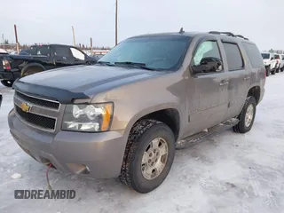 2013 Chevrolet Tahoe LT with VIN 1GNSKBE0XDR296094, listed as a IAAI auction lot 41448160 with 167,165 mi miles and . Bid and sale history available at DreamBid. Image 2.