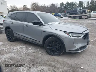 2022 Acura MDX w/A-Spec Package with VIN 5J8YE1H03NL005814, listed as a IAAI auction lot 41344349 with 64,935 mi miles. Bid and sale history available at carsss.com. Image 1.