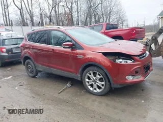 2015 Ford Escape Titanium with VIN 1FMCU9J98FUC90018, listed as a IAAI auction lot 41671941 with 102,335 mi miles. Bid and sale history available at carsss.com. Image 1.